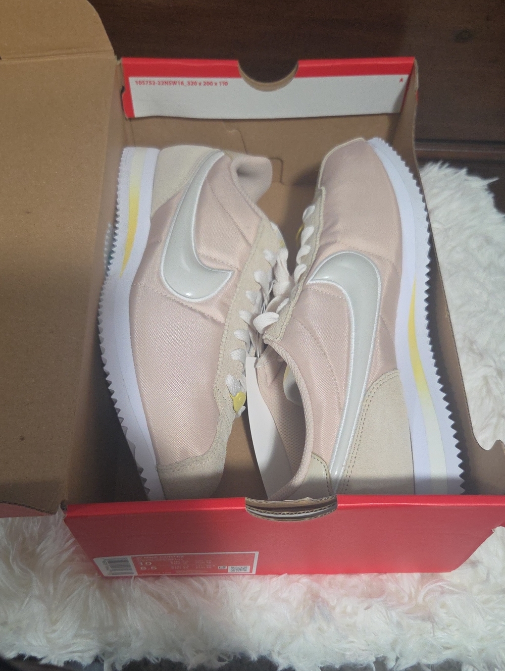 Nike Women's Retro Runner in Blush Pink with Ivory Swoosh and Yellow Accent